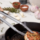 Spaghetti Forks are unitaskers. Tongs work just as well, and can be used in lots of other cooking situations too.